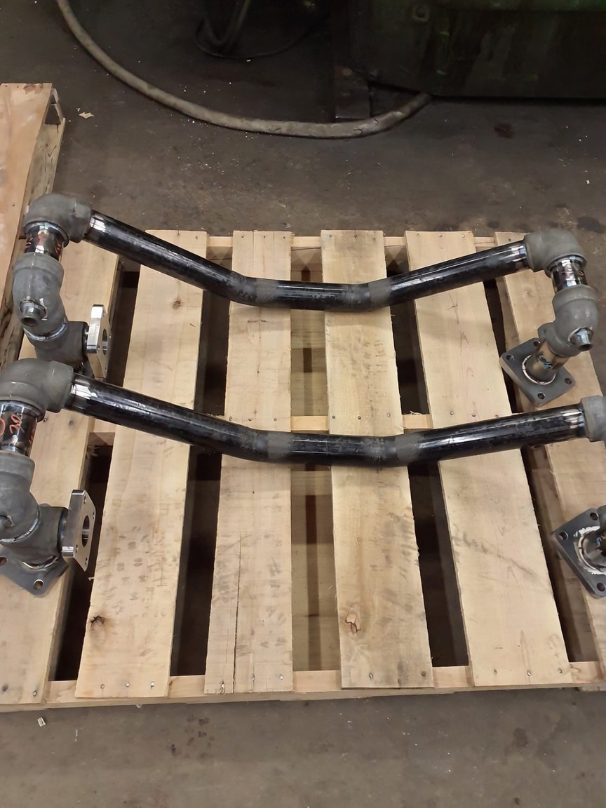Welded steel motor and pump bases with compressor bedplates