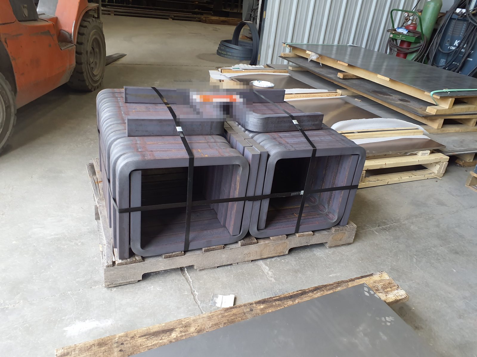 Brake-formed steel channel sections banded for shipment